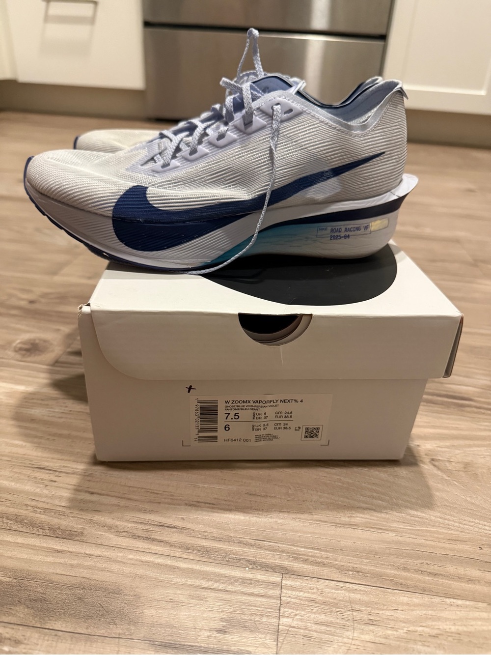Nike Women’s White and Navy Blue ZoomX Racing Shoes